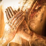 Close up hand of statue Buddha.buddhism concept